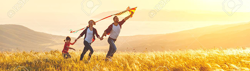 picture of a family flying a kite
